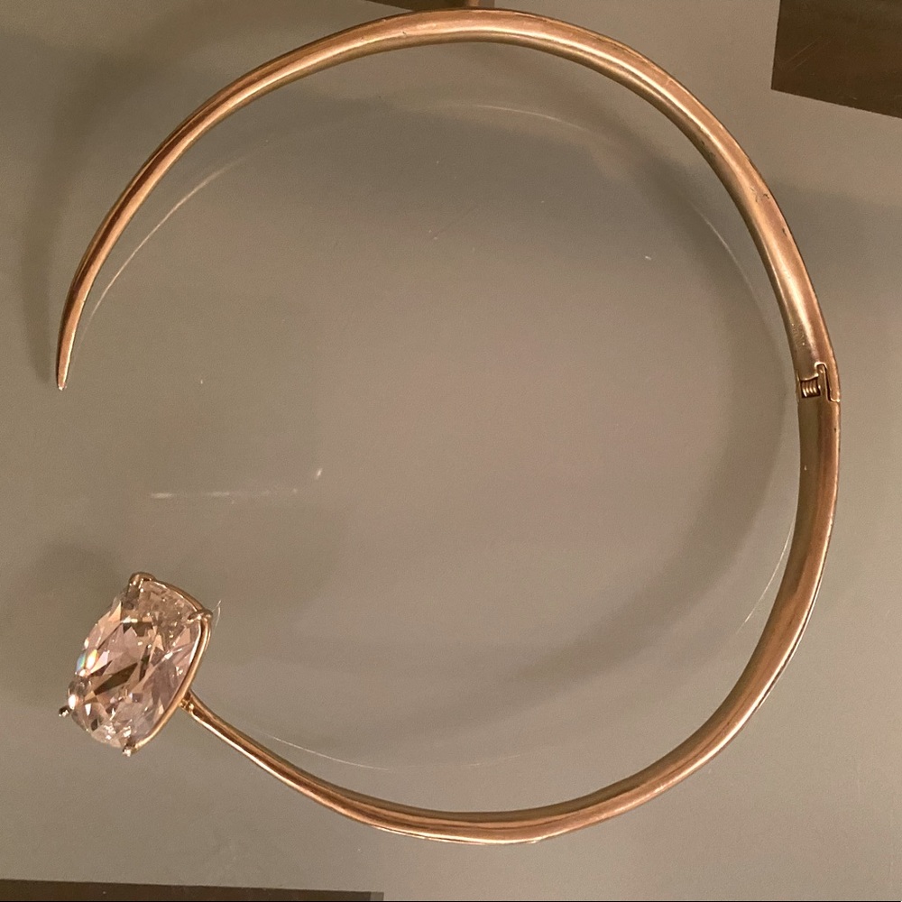 Alexis Bittar golden choker with a large crystal